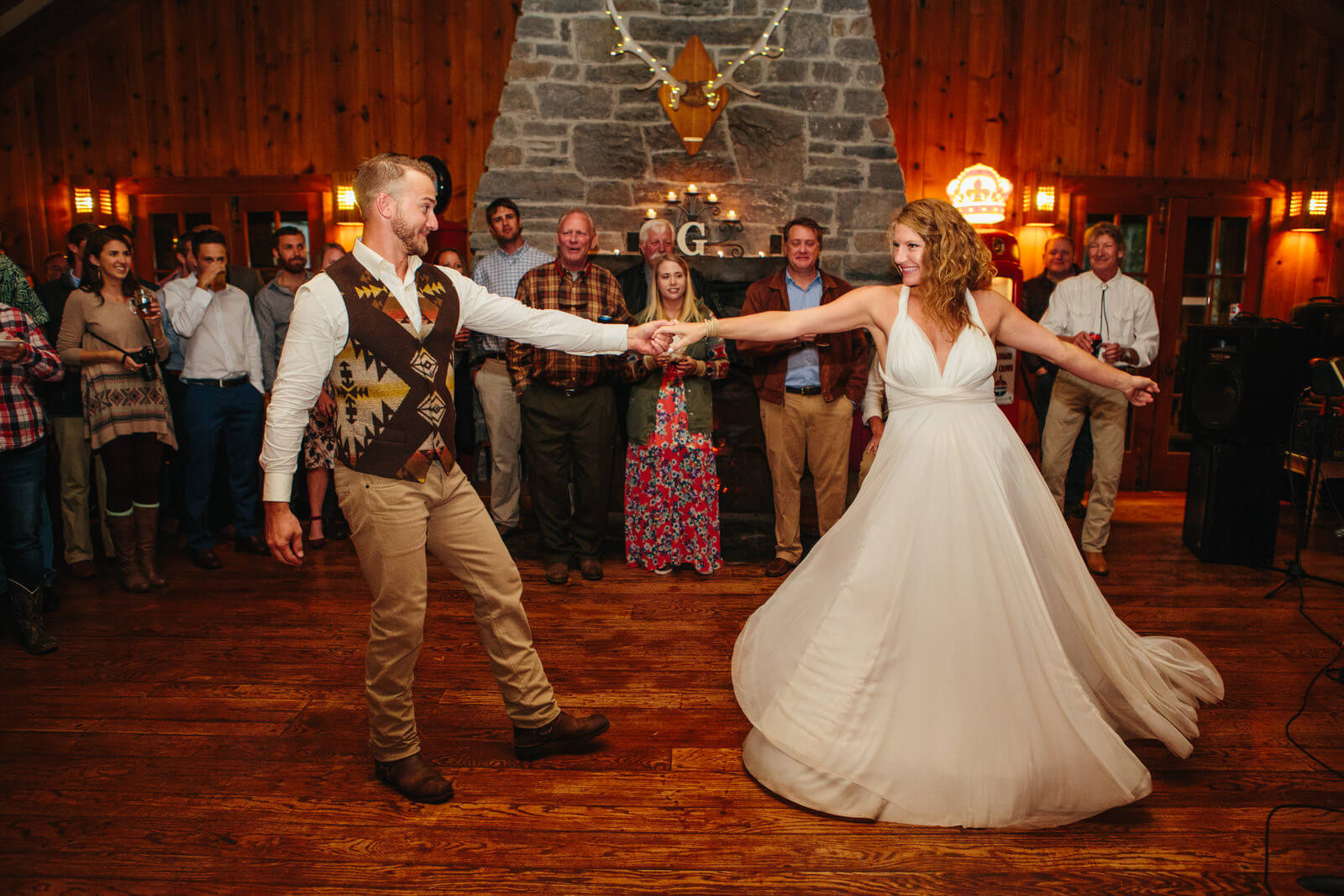 A bride and groom dance during their wedding at Six Mile Estate in Bigfork Montana